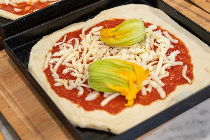 Authentic Italian pizza with zucchini flowers.