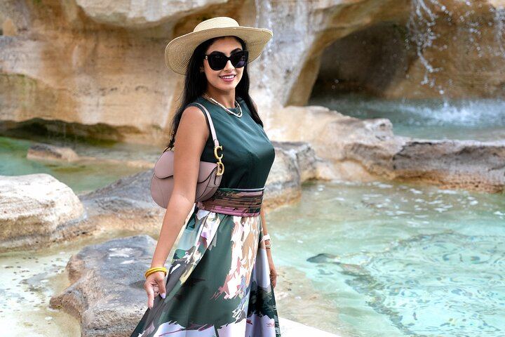 Beautiful solo portrait at Trevi Fountain in Rome, perfect for timeless travel memories and elegant photography.