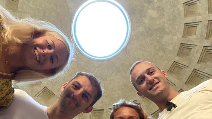 Four friends with the oculus above their heads