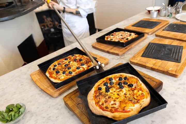 Golden and crispy pizzas fresh out of the oven.