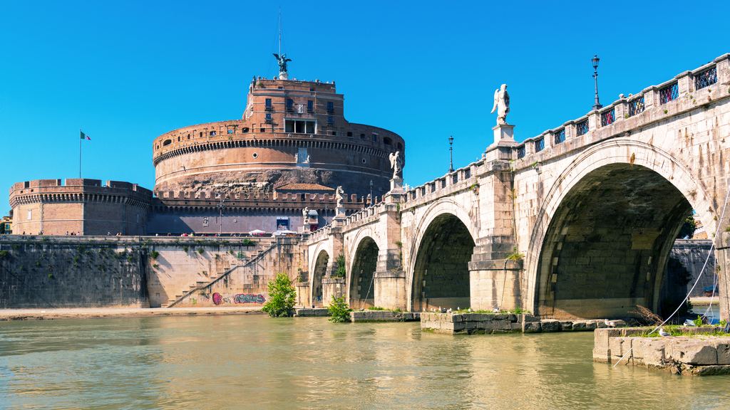 The cylindrical drum of Castel Sant'Angelo seen from the bank of the Tiber in Rome