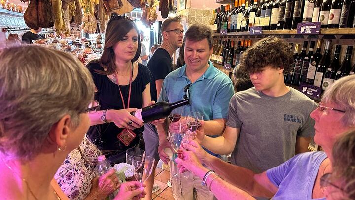 Having fun during our tour drinking local wine
