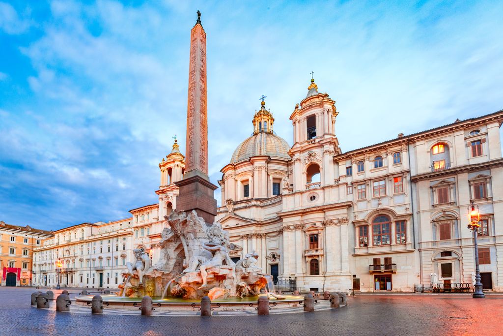 Bernini's Fountain of the Four Rivers with its Egyptian obelisk in Piazza Navona, the church of Sant'Agnese in Agone behind