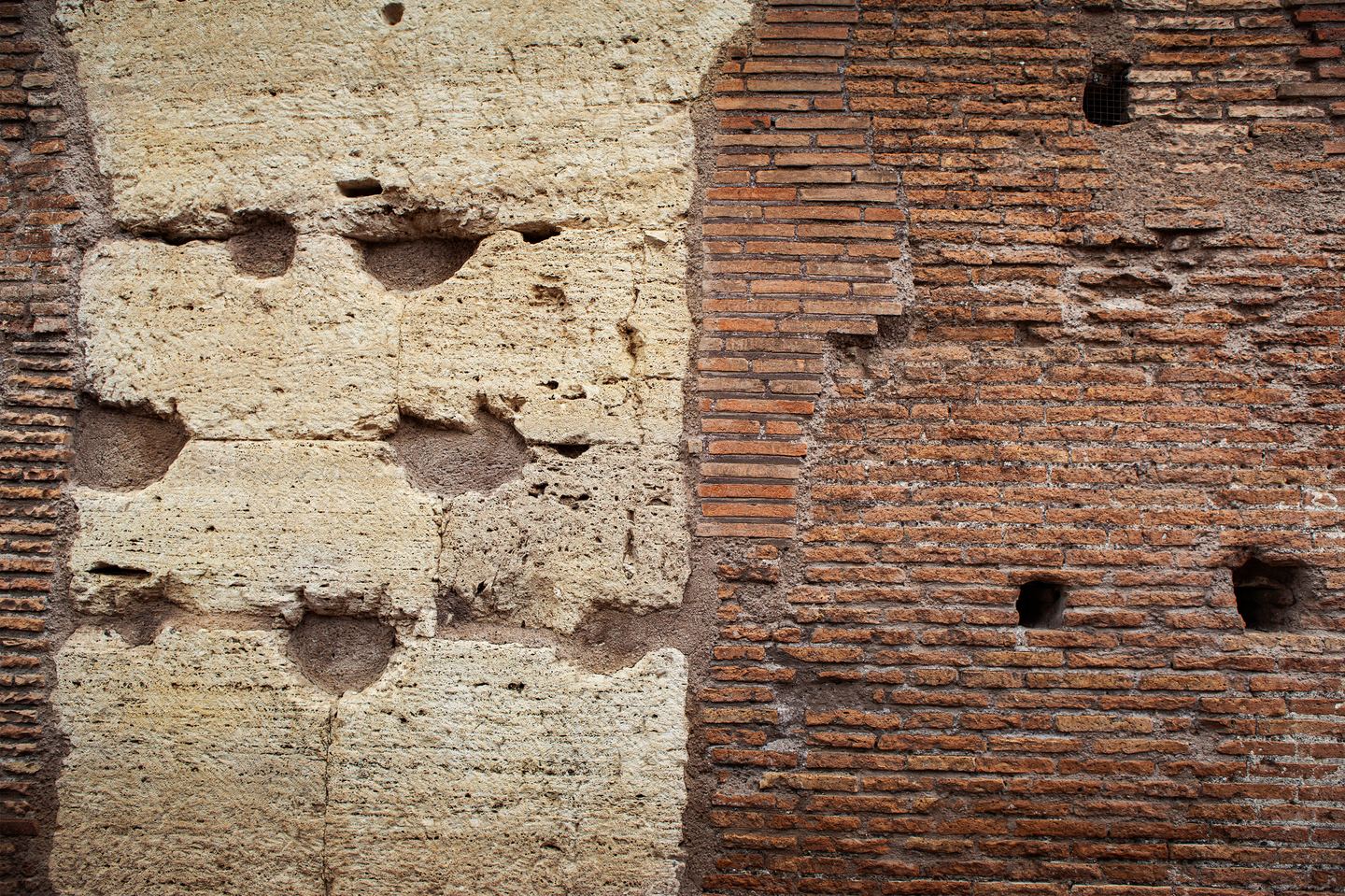 A Roman wall in close-up: the concrete core on one side, thin Roman bricks with thick mortar beds on the other