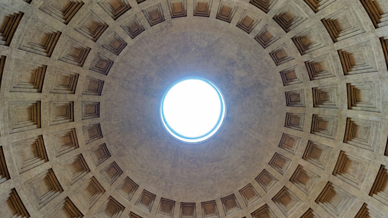 The Pantheon's dome photographed straight up: five concentric rings of coffers narrowing to the open oculus