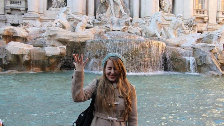 Throw a coin in the Trevi Fountain